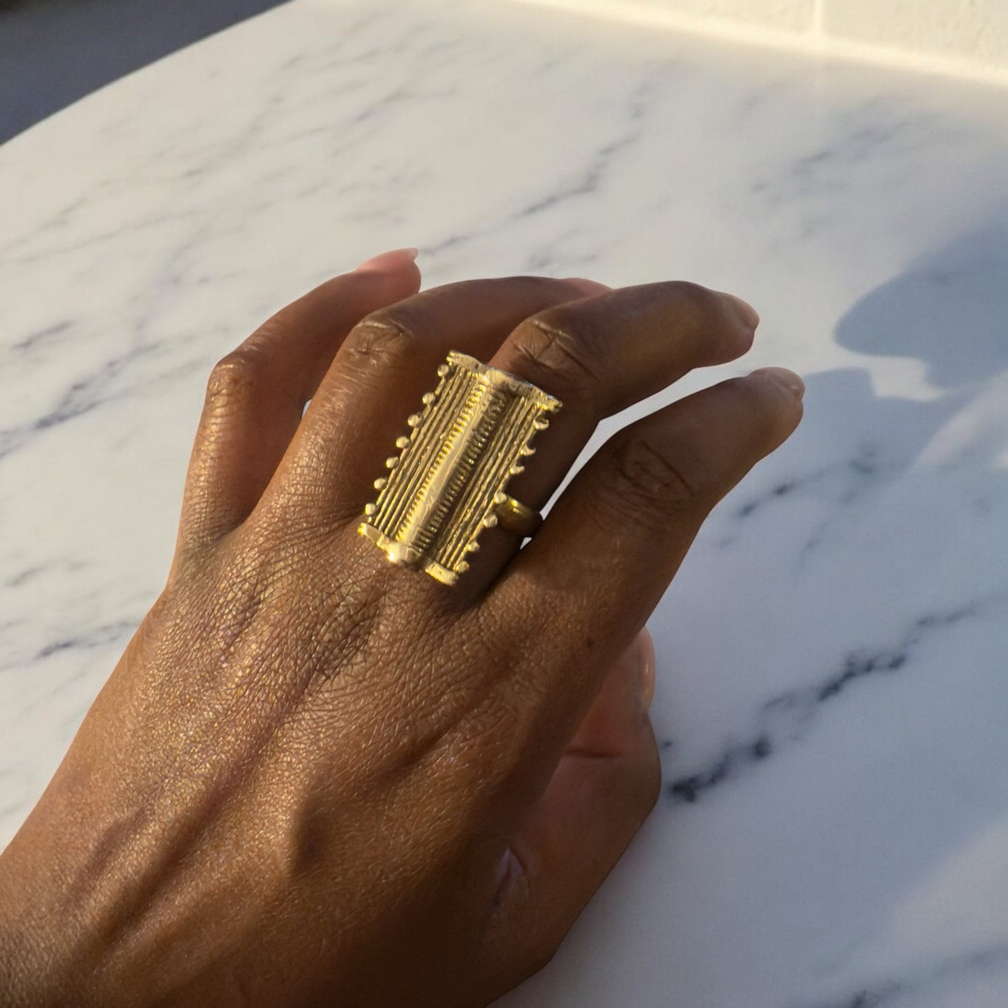 Håndlaget afrikansk ring